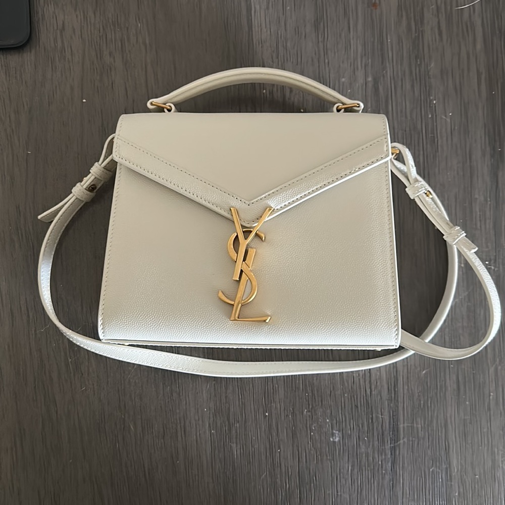 Saint Laurent CASSANDRA MINI TOP HANDLE BAG IN GRAIN DE POUDRE EMBOSSED LEATHER